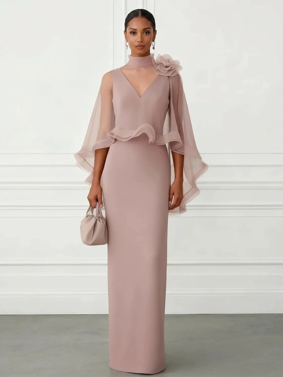 Amapola, vestido largo de gala rosa palo con capa transparente y flor 3D, vista frontal