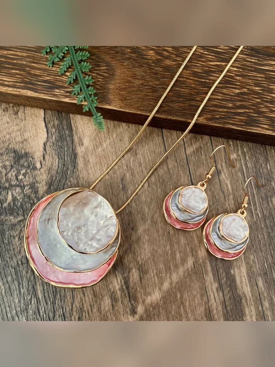 Set de collar y aretes esmaltados en rosa y coral