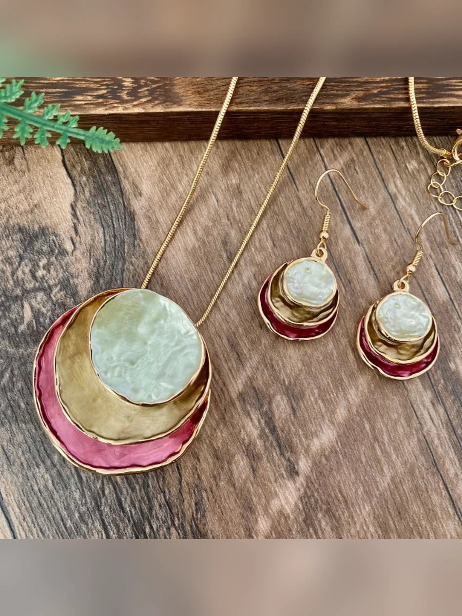 Set de collar y aretes esmaltados en rosa y oliva