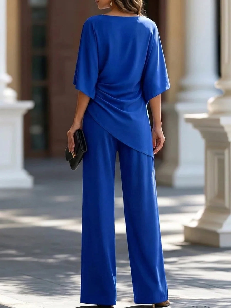 Conjunto de blusa y pantalón ancho en azul rey, vista trasera